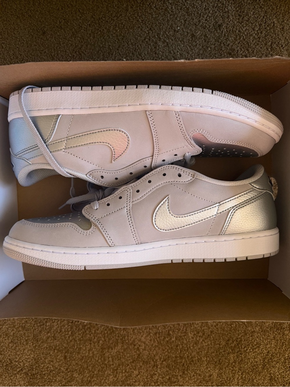Jordan• 1 Retro Low OG in Neutral Grey, Metallic Silver